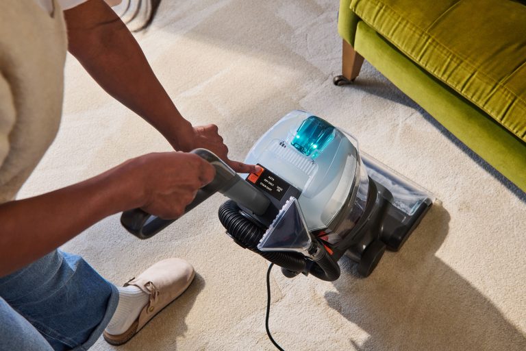 What is VAX StainShot Technology and how does it work?